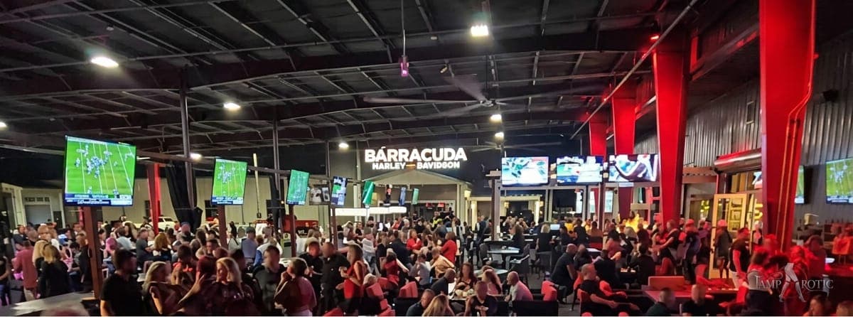 A wide view of a full club-takeover crowd at a TampArotic Tampa Bay lifestyle night — faces blurred for privacy.